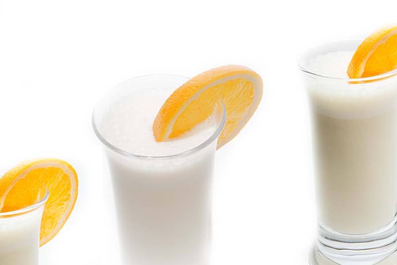 Rezept Longdrink Sahnecocktail Glas mit Orangescheibe